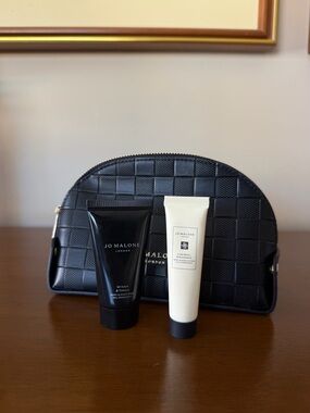 Jo Malone travel bundle with cosmetic bag, lotion, and hand & body wash